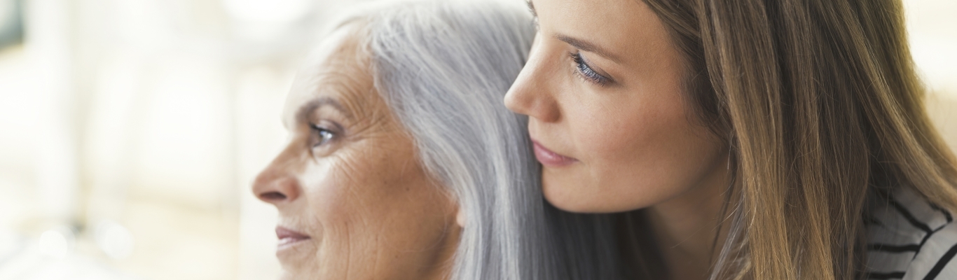 Mother and Adult Daughter Looking Away from Camera