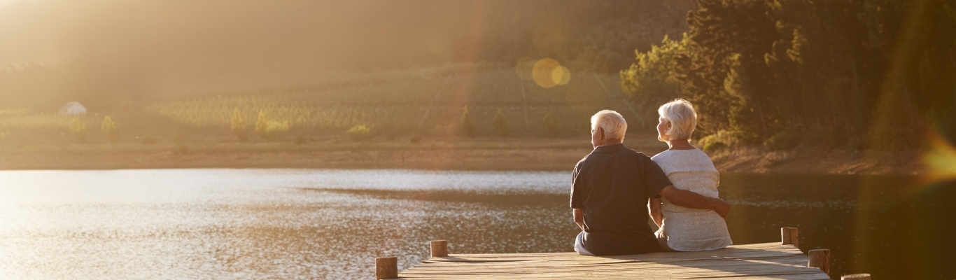 Couple sitting on dock